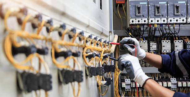 Professional Electrician technician working in Camden, DE